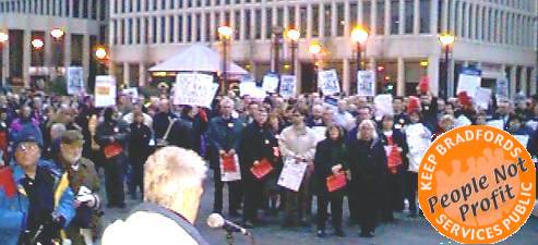 [Union rally outside City Hall]